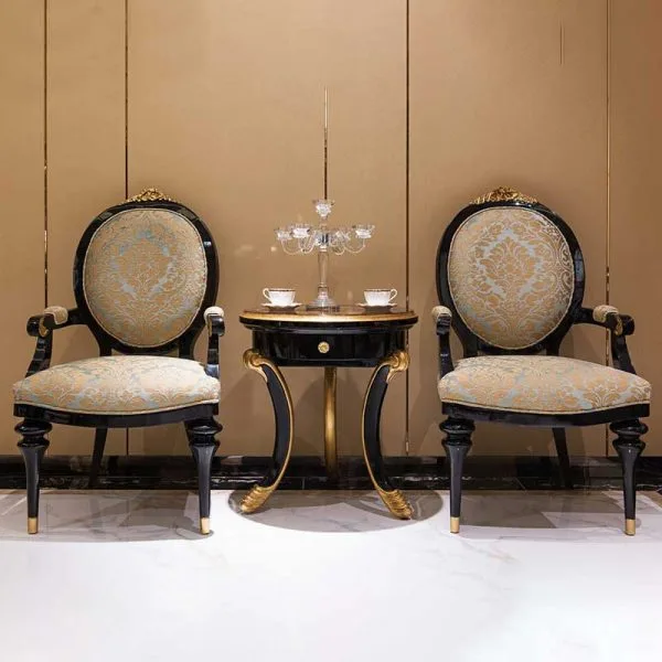 Bespoke Ebonised Medallion Armchair featuring a high-gloss black lacquer frame, gold leaf detailing, and champagne jacquard upholstery by OE-FASHION Interiors.