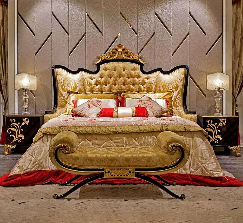 Bespoke Ebony & Gold Wingback Bed featuring a high-gloss ebonised frame with gilded cresting and deep button-tufted