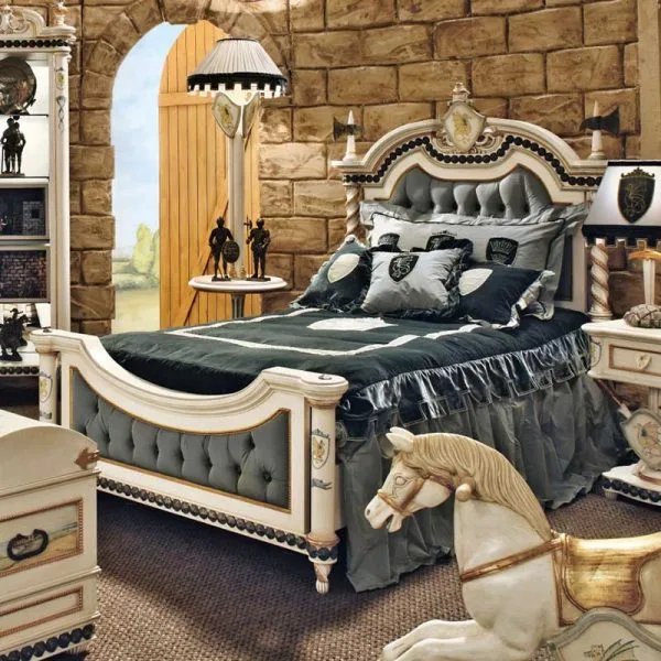 Bespoke Heraldic Shield Youth Bed featuring an antique cream frame with slate grey dentil moulding and a central heraldic crest, crafted by OE-FASHION Interiors.