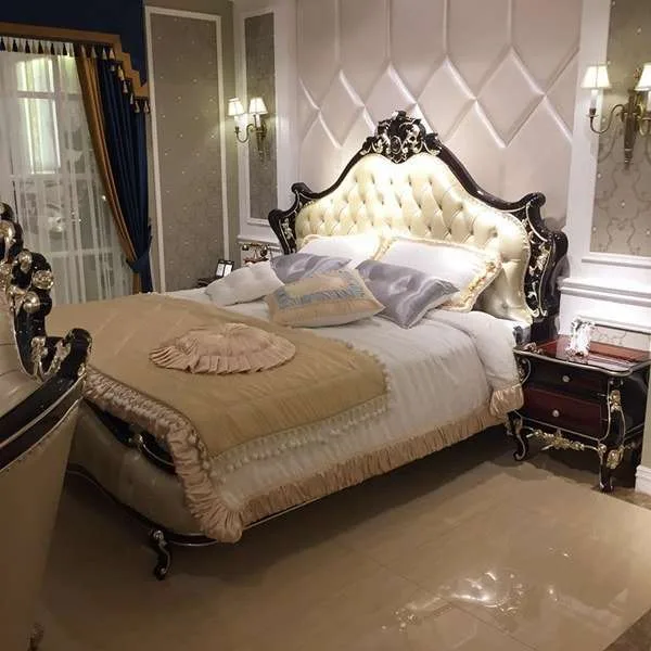Hand-Carved Rococo Tufted Bed featuring a dark walnut frame with silver leaf accents and cream button-tufted upholstery, produced as a bespoke piece by OE-FASHION Interiors.