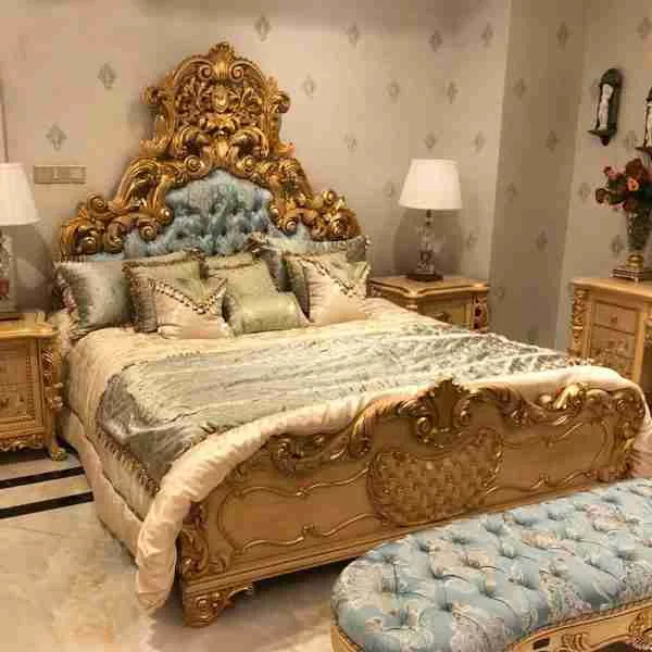 Antique Gold Baroque Bed with Teal Tufted Headboard displaying monumental pierced carving and diamond capitonné.