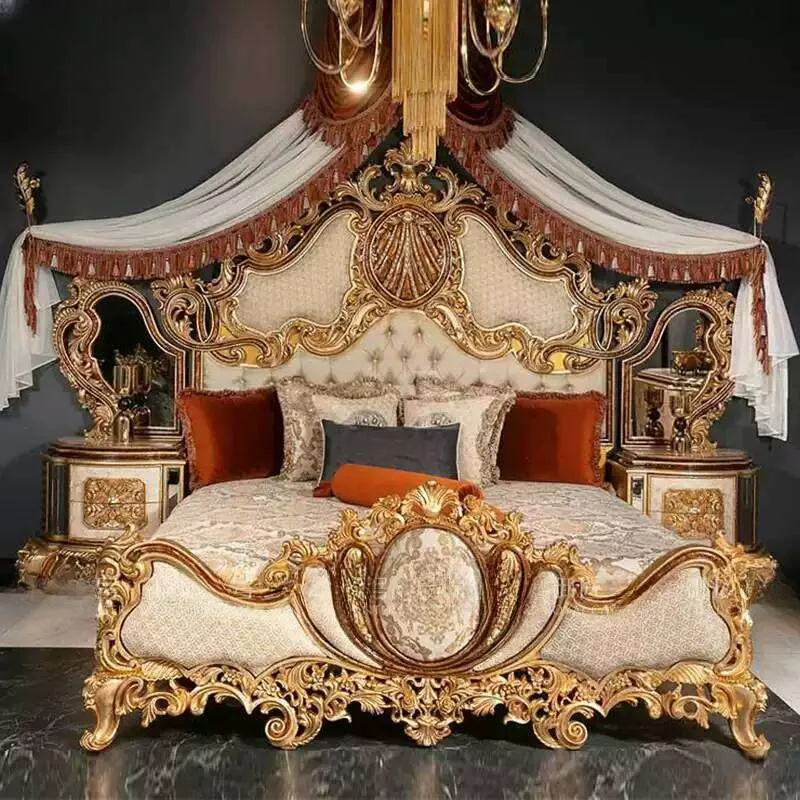 Bespoke Grand Baroque Gilded Bedroom Suite featuring a towering headboard with integrated side mirrors, central shell motif,