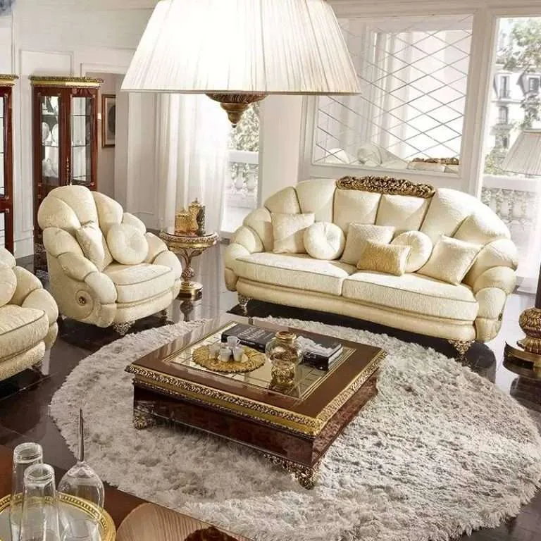 Bespoke Ivory Shell Back Sofa Suite featuring a radiating conch-style backrest, rolled arms with decorative bosses, and gilded acanthus feet.